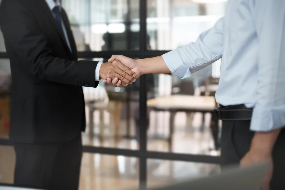 Photo of people shaking hands