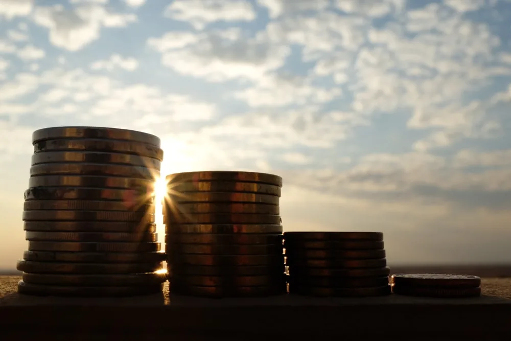 Closeup of stacks of coins representing vehicle depreciation
